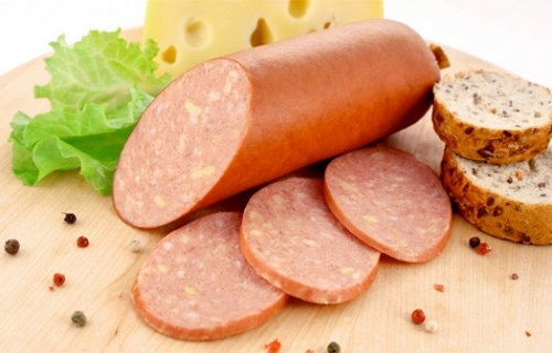Колбаса варено-копченая"КУПЕЧЕСКАЯ С СЫРОМ"